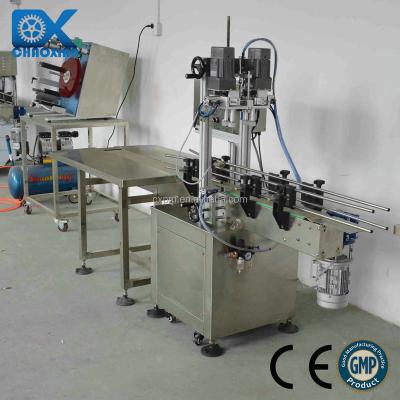 China Beverage Dispenser Automatic Bottle Capping Machine Valve Bottle Capper for sale