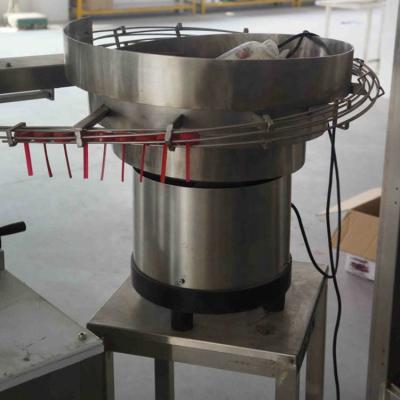 China Food Guangzhou CX Automatic Bottle Screw Feeder For Capping Machine for sale