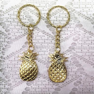 China Cheap Color Pineapple Gold Key Chains Promotional Gifts Return Party Favor Door Wedding Key Chain for sale