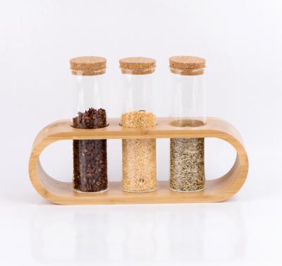 China Freshness Preservation GPG130 High Borosilicate Glass Spice Jar With Cork Lid And Bamboo Holder for sale