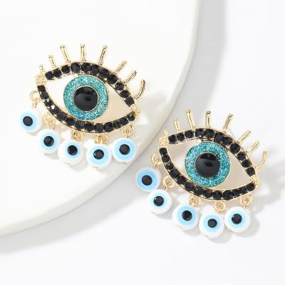 China Newest Unique Designs FASHION Hollow Devil Eyes Stud Earrings Ethnic Style Glazed Eyes Tassel Colorful Earrings for sale