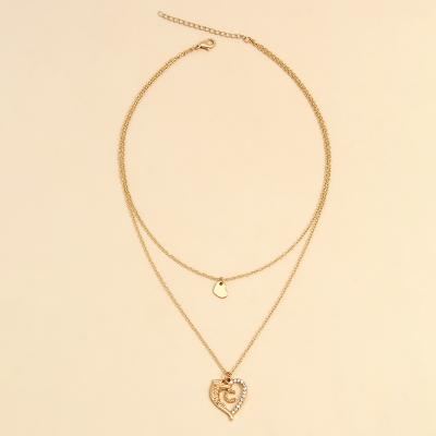 China TRENDY Double Layer Heart Pendant Necklace Layered Crystal Heart Letter C Pendant Necklace for sale