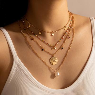 China Other Bohemian Multi Layers 4Pcs Colorful Seed Beads Star Charm Necklace 18k Gold Plated Irregular Coin Bead Pendant Necklace for sale