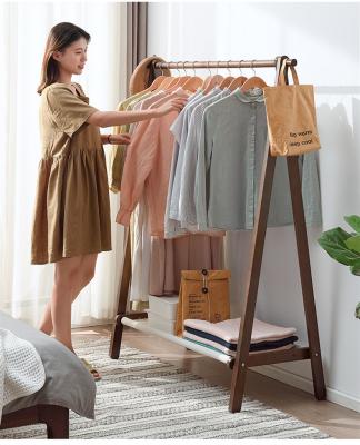 China Simple modern chinese minimalist vertical coat rack new floor hanger clothes rack can be customized for sale