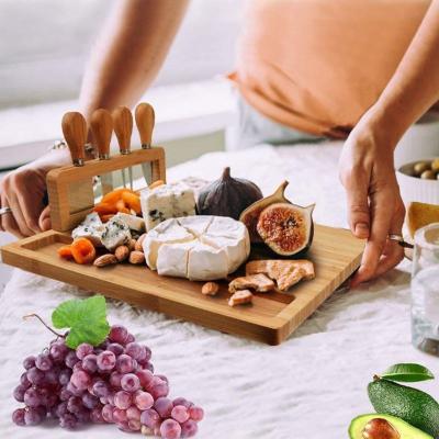 China Factory Outlet Products Sustainable Wood Tray Bamboo Cheese Board Cooked Food Tray for sale