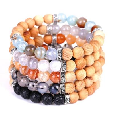 China Fashion Sell Hot Cracked Agate and Unpolished Wood Wholesale Beads Lava Stone Diffuser Bracelet Sale Bangles 8mm for sale