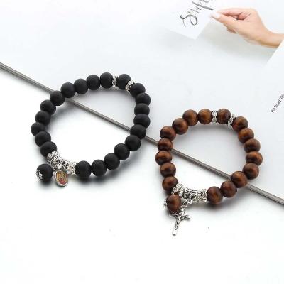 China Fashion Couple Wooden Bead Rope Connection Alloy Elastic Bracelet Christ Jesus Cross Bracelet Bead Amazon Hot Selling for sale