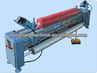 China Semi-automatic PENGLONG GARMENT Packing Machine , Textile Roll Packaging Machine for sale