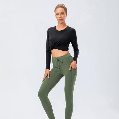 China Direct Sales Breathable Custom Made Modern High Stretch Fabric Sport Eco-friendly High Waist Lady Yoga Pants With Pockets for sale