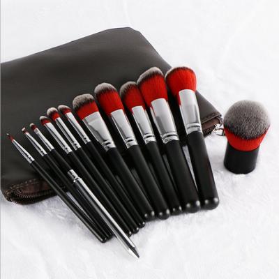 China Angular Blush Sialia 12pcs Customized Logo Customized Bag Pouch Packaging Makeup Brush Set Beauty Tools for sale