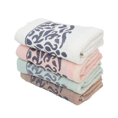 China Solid Color Factory Stock Hotel Bath Towel Polyester Gift Hotel Spa Face Cloth Thick Cotton Printed Soft Shower Highly Absorbent for sale