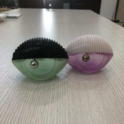 China Personal Care Junfeng 70ml Eye Shape Special Perfume Bottle for sale