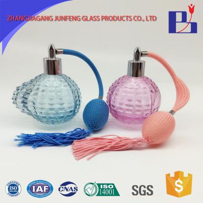 China Personal Care Junfeng 110ml Sphere Shaped Glass Bottle With Bulb Atomizer for sale