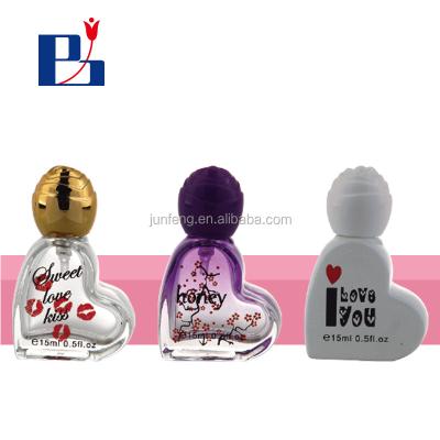 China Personal Care Hot Selling 15ml Heart Shape Glass Perfume Bottle With Pump Spray for sale