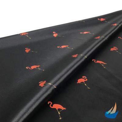 China Hot Trending Products 2020 Anti-Static 50D Polyester Flamingo Printed Satin Fabric 98GSM for sale