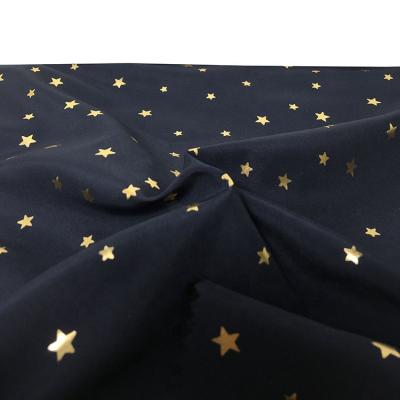 China Store Factory Price Hot Stamping With Stars Soft 100% Polyester Fabric For Clothes for sale