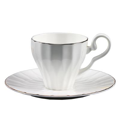 China Viable British style pure white embossed platinum or gold rim bone ceramic teacup saucer for sale