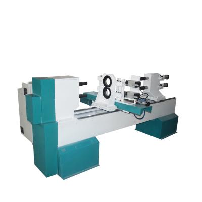 China Hotels 1530 Double Spindle CNC Wood Lathe Machine With Double Knife for sale