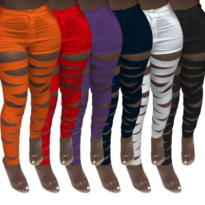 China 2021 Summer Fashionable Tall Solid Casual Pencil Anti-Wrinkle Pants Sexy Women Hollow Out Pants For Women for sale