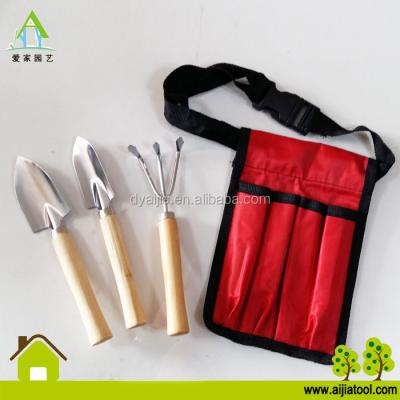 China PP Mini Garden Tool Kit Kids With Fork Plastic Trowel Bag 600D Weeder Wooden Handle for sale