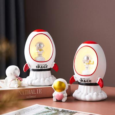 China Night Coastal Light Rocket Astronaut Birthday Gift Room Boy Resin Decoration Props Creative Desktop for sale