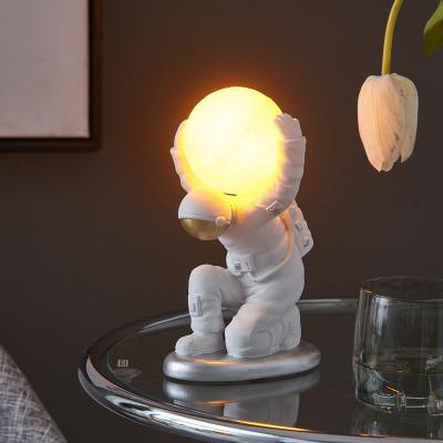 China Luxury Nordic Night Light Resin Material Usb Lamp Children's Morden Astronaut Bedroom Bedside Lamp for sale