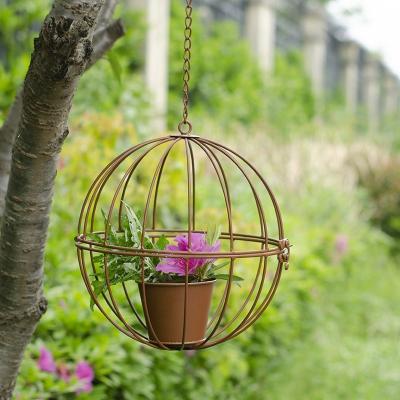 China Metal Pastoral Rusty Decoration Hanging Basket With Pot for sale