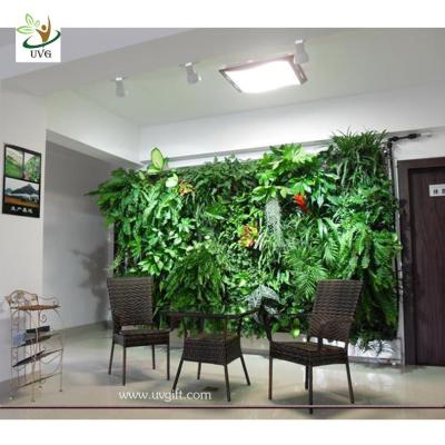 China UVG Artificial Green Plastic Plants Fake Vertical Garden Living Wall indoor landscaping for sale