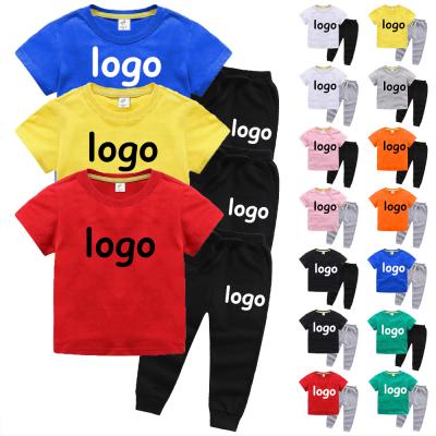 China Casual Kids Clothes 3-13 Years Old Kids Clothes Custom T-shirt Jogging Pants 2 Pcs Sets LOGO Summer Cotton Girl Boys Sport Sets for sale