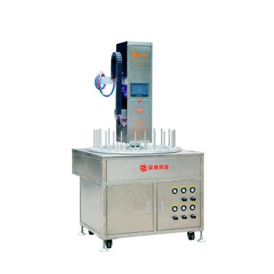 China Hot Selling Automatic Inner Cosmetic Spray Wrapping Machine For Vacuum Cup for sale