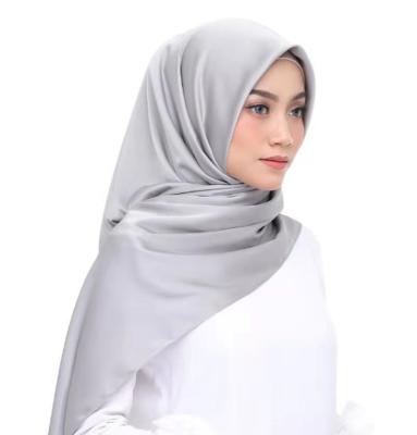 China Muslim women's scarf solid color big hizab women's scarf elegant square shiny and soft ladies flower hijab for sale