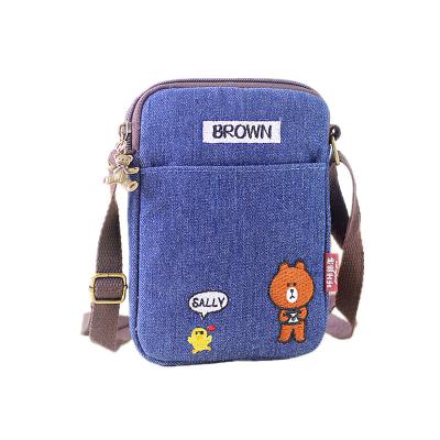 China 2021 Fashion Trendy Denim Embroidered Diagonal Small Bag And Messenger Fabric Cartoon Mobile Phone Bag for sale