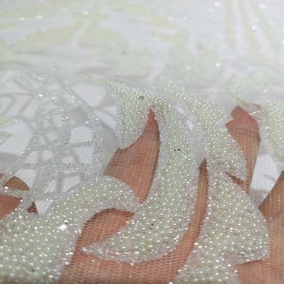 China Glitter Glued Viable Newcomer Shiny White Wedding Beads Sugar Lace Polyester Fabric Material For Lady Party Dress Tulle With Bead for sale