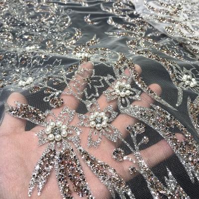 China Viable White Lace Tulle and Rose Gold Rhinestone Fabric with Luxury Glitter Mesh Beaded Design Textiles for Couture Dress Gowns for sale