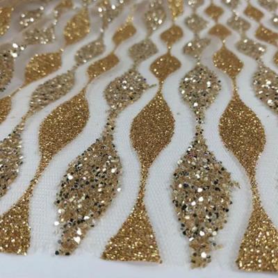 China Viable High Quality Luxury Silver Color Glitter Bonded Tulle Mesh For Party Wedding Dress Hot Sale Gold Sparkle Lace Up Fabric With Sequins for sale