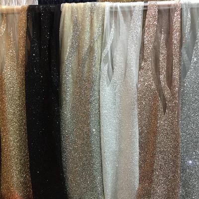 China Wholesale Viable High Quality Indian Trim Mesh Fabrics African Party Dress Champagne Wedding Dress Sequins Glued Tulle Materials for sale