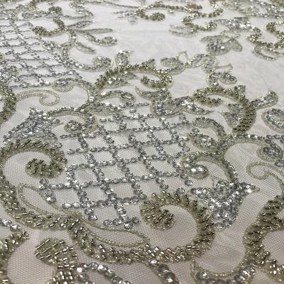 China Viable Shiny Silver Sequin Embroidered Bead Tubes Lace Up Fabric For Dress Classic Ceremony Fashion Handmade Applique Pageant Ball Tulle for sale