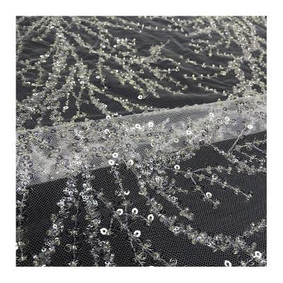 China Luxury Viable Quality Embroidery Sequins Lace Up Fabric Beaded Tulle Mesh Textiles White For Sewing Bridal Floral Dress Materials Wedding for sale