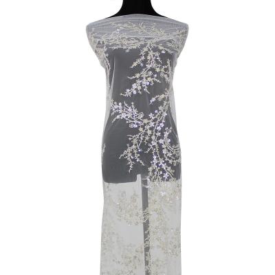 China Luxury Bridal Evening Dress Sequin Embroidery Beaded Floral African Swiss Viable Lace Fabric Luxury Shiny Material For Women Dress for sale