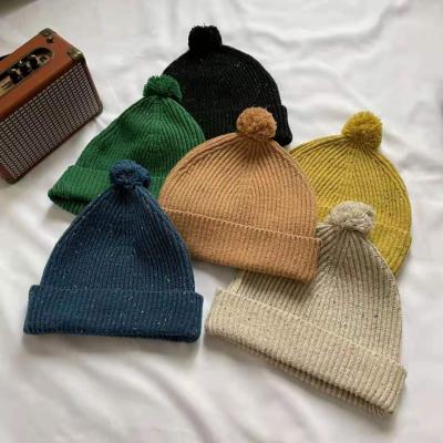 China COMMON knitted mixed color warm hats women's earmuffs W006 autumn and winter dye knotting student couples woolen hats for sale