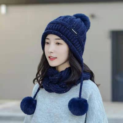 China A010 autumn and winter beautiful COMMON wool ball hat thickening ear cover warm knitting hat for sale