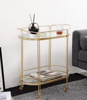 China Nordic Lightweight Luxury Living Room Dining Trolley Rack Trolleys Tea Cabinet Wine Cabinet Removable Golden Trolleys for sale