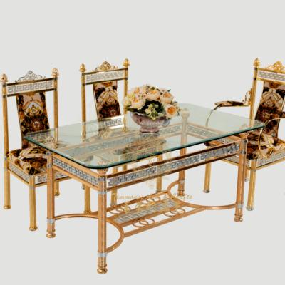 China Luxury Slipcovered Tempered Glass 4-6 Person Table With Chairs Kitchen Dining Furniture Set Gold Dining Table for sale