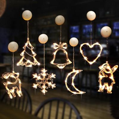 China Christmas Decoration 2021 Merry Christmas Decoration LED Lights Snowflake Bells Smart Suction Cup Window Hanging Light Christmas Lights For Home for sale