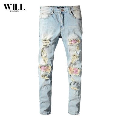 China Breathable New Trend Personality Retro Patch Panels Fringed Slim Fit Leg Pants Mens Jeans for sale