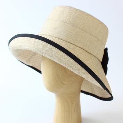 China 2022 Fashion High Quality Bowknot Sun Hat Wide Brim Foldable Soft Sun Visor Straw Beach Hat Wholesale for sale