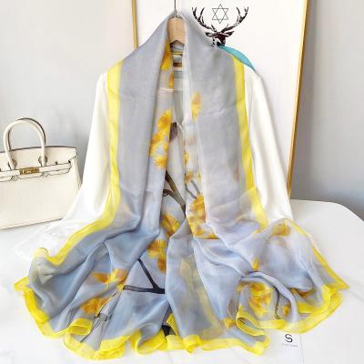 China Thin section of polyester moire yarn is prevented bask in silk fabric summer vacation woman with scarf size one large seaside beach shawl. for sale