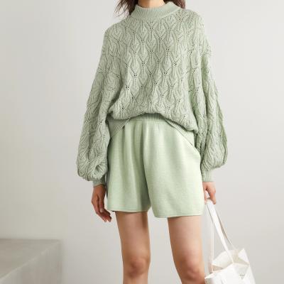 China Anti-wrinkle fashion oversized hollow puff sleeve knitted pullover loose round neck plus size sweaters women for sale