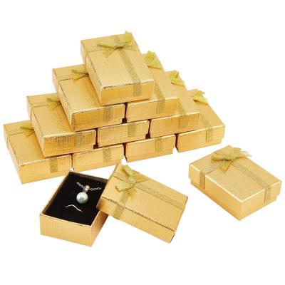 China Eco - Friendly Gold Rectangular Paper Jewelry Boxes Packaging Gift Cases With Ribbon for sale