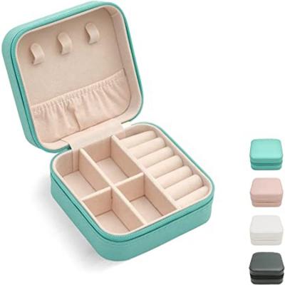 China Portable Travel Eco-friendly Mini Jewelry Box Leather Jewelery Ring Organizer Case for sale